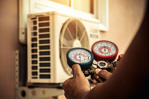 Professional Heat Pump Repair technician working in Mansfield, MO